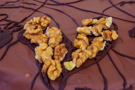 Abstract tort decoration with walnuts like a heart