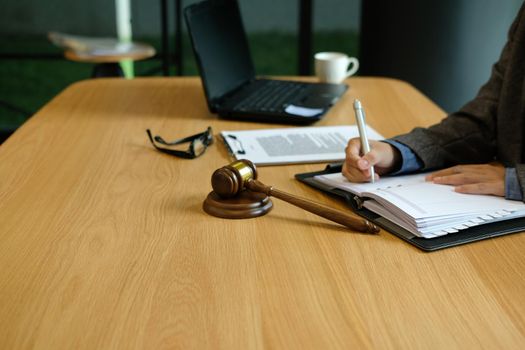 lawyer judge attorney justice working writing note at court. legal law gavel at courtroom.