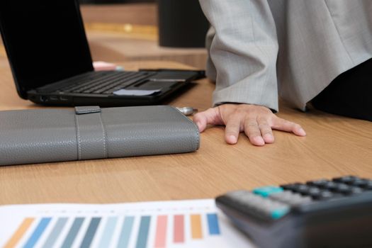 man thinking, businessman working with computer at workplace coworking office