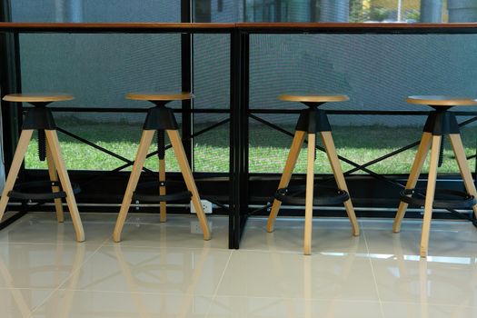 wood stool chair in cafe coffee shop cafeteria restaurant food center interior