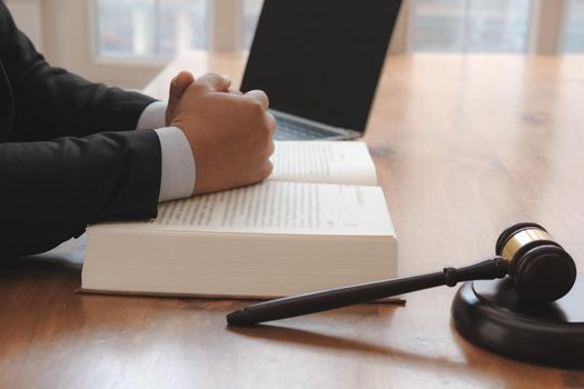 judge with legal law gavel & book at courtroom. lawyer attorney justice at court