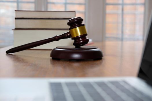 legal judge gavel & law book at courtroom. lawyer attorney justice workplace