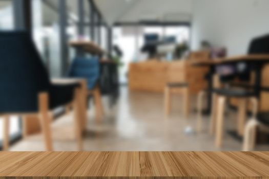 cafe coffee shop cafeteria blur defocused background with wood table for display montage product