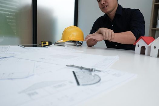 engineer suffering from wrist pain. architect feeling painful on arm. injury, office syndrome.