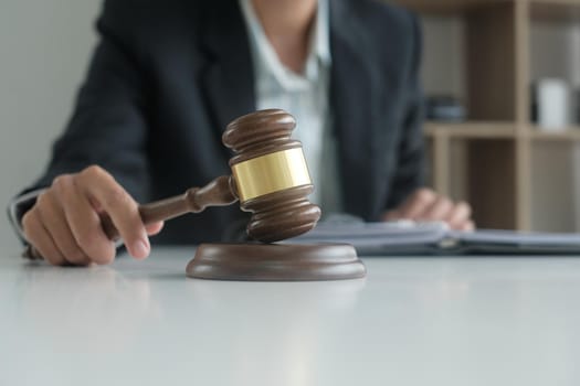 judge holding legal law gavel. lawyer attorney justice workplace