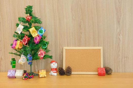 decorated christmas tree & blank cork board. xmas new year holiday festival.