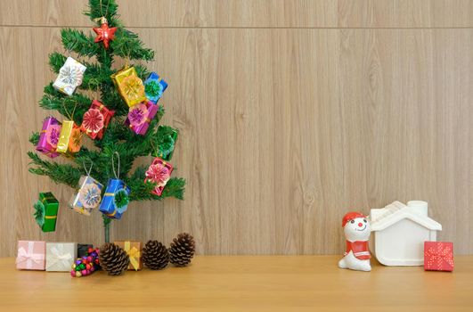 present boxes and decorated christmas tree. gift box for xmas party. holiday celebration in december
