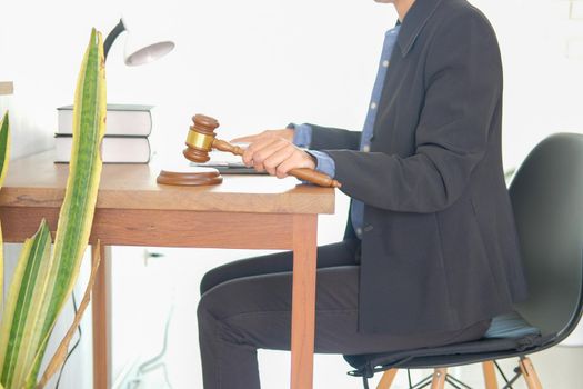 judge holding legal law gavel at courtroom. lawyer attorney justice at court