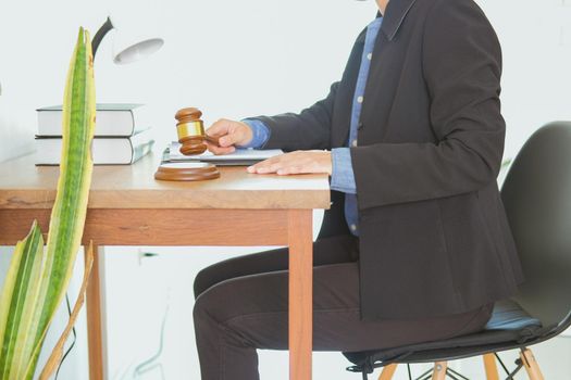 judge holding legal law gavel at courtroom. lawyer attorney justice at court