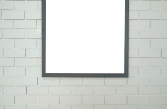 black mock up poster photo frame on white brick wall