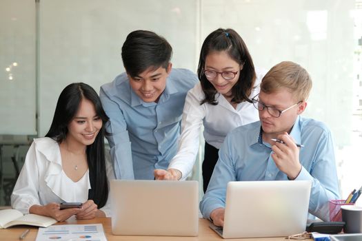 business people discussing on performance revenue in meeting. businessman working with co-worker team. financial adviser analyzing data with investor.