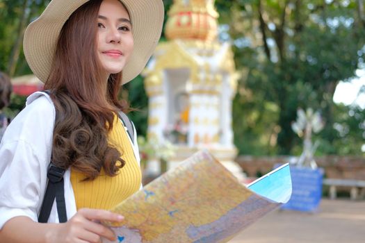 young asian woman traveler tourist with map. journey trip travel concept