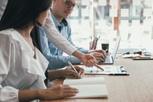 business people discussing on performance revenue in meeting. businessman working with co-worker team. financial adviser analyzing data with investor.