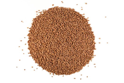 Texture of buckwheat. Background for dry buckwheat design. Large size for banner printing or packaging. Top view of evenly scattered buckwheat groats