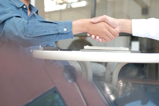 Business people shaking hands after meeting. colleagues handshaking after conference. Greeting deal, teamwork partnership cooperate concept.