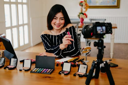 beauty blogger live broadcasting cosmetic makeup tutorial on social media. vlogger recording vlog video. influencer marketing