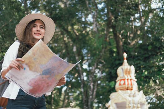 young asian woman traveler tourist with map. journey trip travel concept