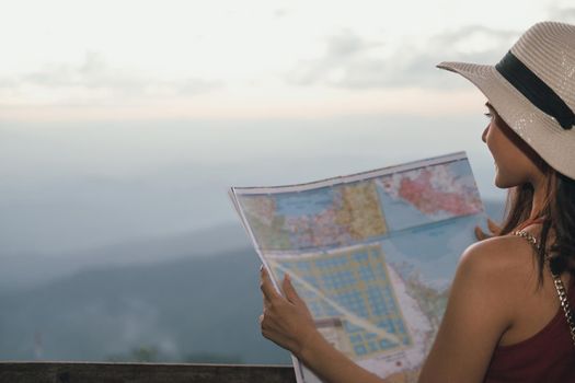 young asian woman traveler tourist with map. journey trip travel concept