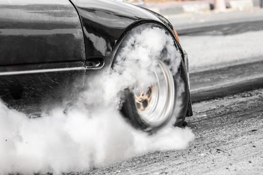 Front wheel drive drag racing car at start line