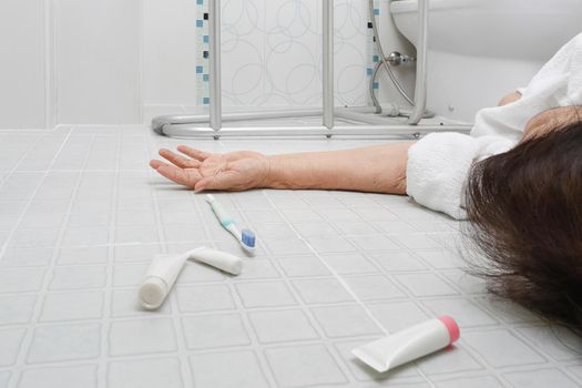 Elderly woman falling in bathroom because slippery surfaces