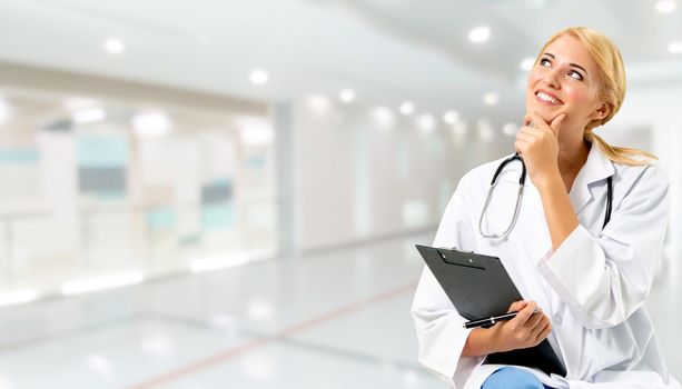 Woman doctor working at the hospital office. Medical healthcare and doctor staff service.