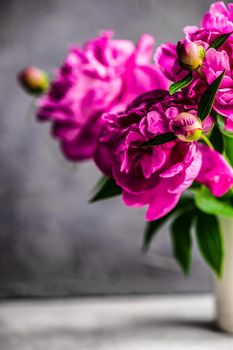 Bouquet of purple peony flowers in the vase