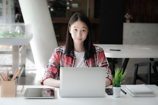 girl teenager college high school student studying with computer laptop