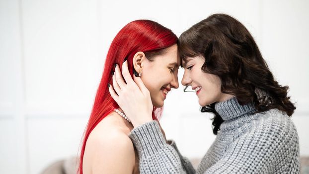 Young Caucasian women hugging tenderly. Same-sex relationships