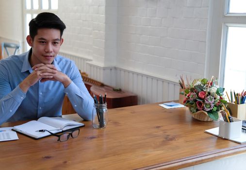 businessman planning business project. man thinking of startup idea at workplace