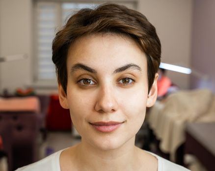 Caucasian woman before procedure in beauty salon