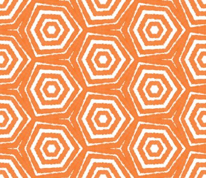 Ikat repeating swimwear design. Orange symmetrical kaleidoscope background. Textile ready interesting print, swimwear fabric, wallpaper, wrapping. Summer ikat sweamwear pattern.