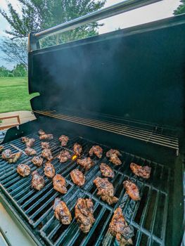 bourbon and brown sugar marinated wings in blackened seasoning