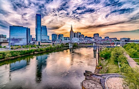 Nashville tennessee city skyline at sunset on the waterfrom