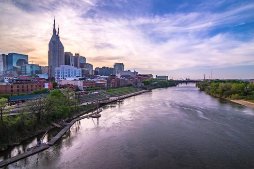 Nashville tennessee city skyline at sunset on the waterfrom