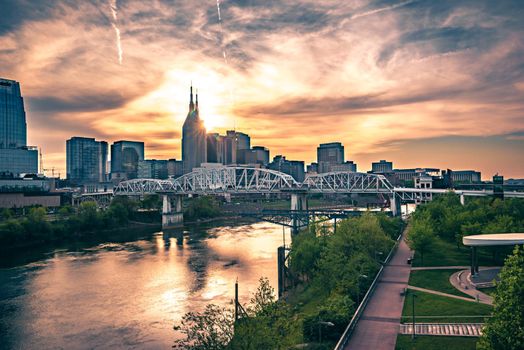 Nashville tennessee city skyline at sunset on the waterfrom