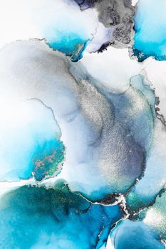 Blue silver abstract background of marble liquid ink art painting on paper . Image of original artwork watercolor alcohol ink paint on high quality paper texture .