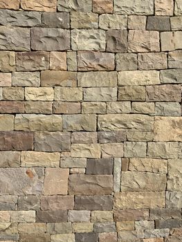 vertical photo wall natural light beige stone bricks