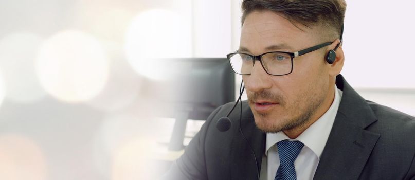 Business people wearing headset working in office to support remote customer or colleague. Call center, telemarketing, customer support agent provide service in broaden view .