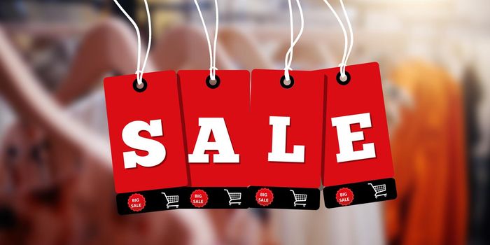 Red hanging sales tags on blur clothing store. Red sale price tag style banner design template.