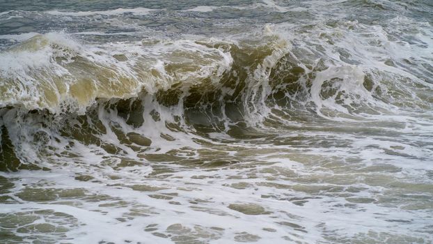 The Black Sea is stormy. Large sea wave. The sea is stormy. Cold stormy Black Sea coast, Georgia.