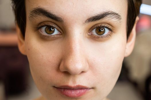 Caucasian woman before procedure in beauty salon