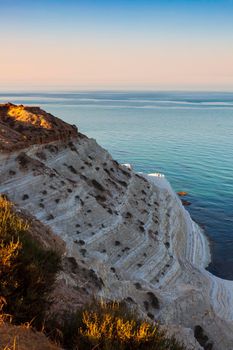 Top view of the limestone white cliffs at the Scala dei Turchi in English caled Stair of the Turks or Turkish Steps near Realmonte in Agrigento province. Sicily, Italy