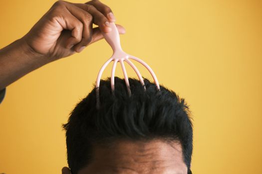 men having a scalp massage with a brush