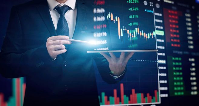 analyzes financial and investment data, planning business, finance and investment strategies on Business finance background.