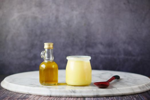 homemade ghee in container on a table