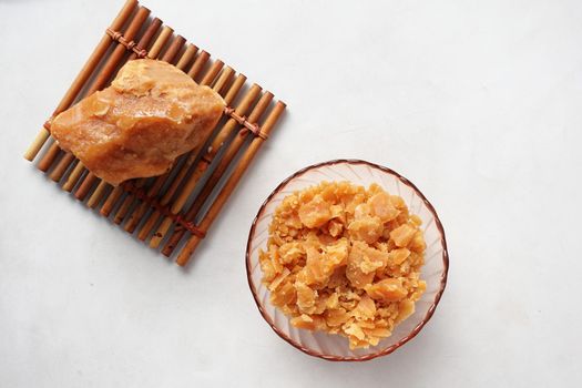stack of Jaggery traditional cane sugar cube on table ,