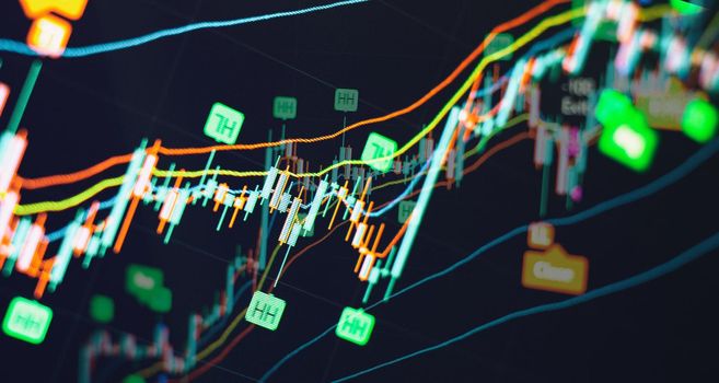 Financial statistic analysis on dark background with growing financial charts. Stock analyzing. Price chart bars.
