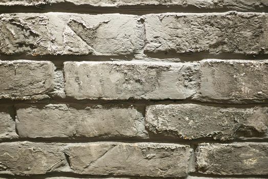 detail show of old gray brick wall ,
