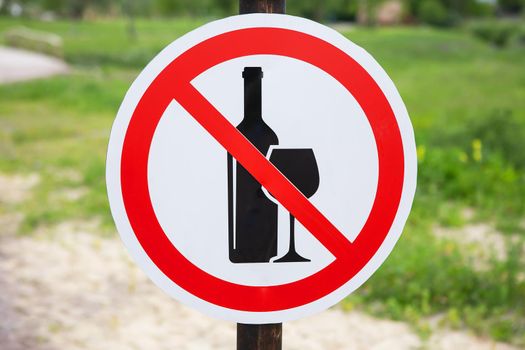 Road sign, no alcohol sign. The concept of safety on the road and driving. Outdoor recreation