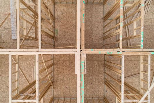 looking straight down through the roof of a house being built